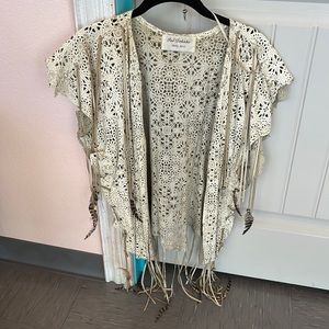 White Leather vest with fringe and feathers